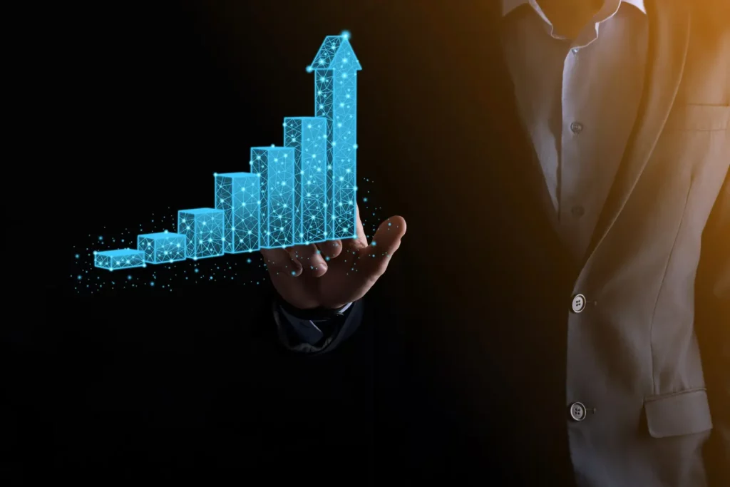 Imagem de um empresário analisando o gráfico de crescimento da empresa.